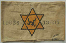 France, white armband with yellow Jewish
                          star with inscription "Juif"
                          ("Jew")