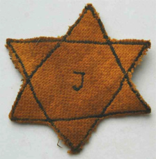 Belgium, Jewish star with inscription
                          "J." (02), compulsory since 27 May
                          1942