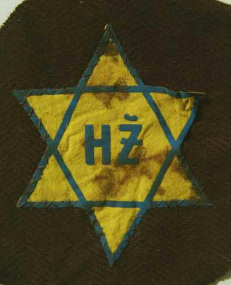 Slovakia, blue Jewish star on yellow
                          ground with inscription H (abbreviation for
                          Slov. "Jew")