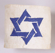 Poland, Stopnica ghetto, white armband
                          with blue braided star