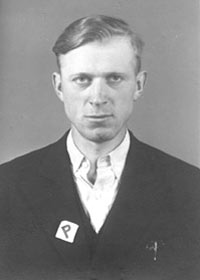 Polish
                        forced labourer with a P badge, portrait