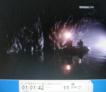 Owl Mountains 19 and 20, Juergen Mueller
                          and Jacek Duszczak cruising in the flooded
                          tunnels with an inflatable boat 01
