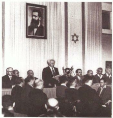 Ben Gurion, declarance of independence with a Herzl
                foto of racist Herzl. The foto is the program, and the
                Arabs will never accept this Herzl state...