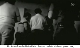 Ndrangheta-Mafiaweihe
                    1985: Es wird Blut auf ein Bild gespritzt 01