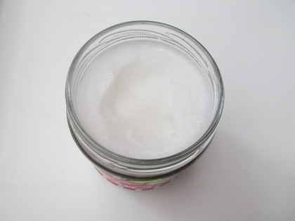 coconut oil in open glass, solid state