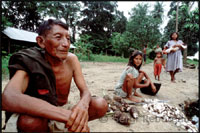 Native people in a
                        settlement in the Orinoco River delta