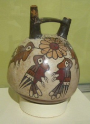 Jug of Nasca culture in Peru with many
                            birds (hummingbirds) on it