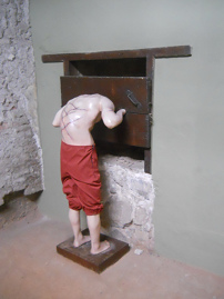 "Christian" torture method
                            with fixed head and arms and lashes on the
                            back