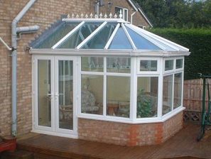 Blue and white
                        window panes in a greenhouse